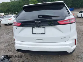2023 Ford Edge SE z VIN 2FMPK4G95PBA49168, wystawiony jako IAAI lot #42403184 z przebiegiem 41 448 mil mil oraz . Historia ofert i sprzedaży dostępna na DreamBid. Obrazek 17.