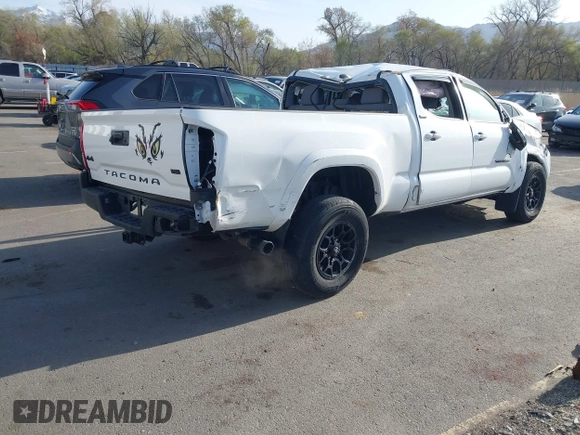 2022 Toyota Tacoma SR5 with VIN 3TMDZ5BNXNM122169, listed as a IAAI auction lot 41992758 with 36,686 mi miles and . Bid and sale history available at DreamBid. Image 4.