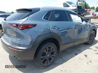 2022 Mazda CX-30 S Carbon Edition with VIN 3MVDMBCL6NM410330, listed as a IAAI auction lot 42107426 with 30,277 mi miles and . Bid and sale history available at DreamBid. Image 4.