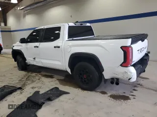 2024 Toyota Tundra TRD Pro Hybrid with VIN 5TFPC5DB7RX081484, listed as a Copart auction lot 57246415 with 12,819 mi miles and Salvage title. Bid and sale history available at DreamBid. Image 2.