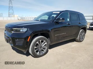 2023 Jeep Grand Cherokee Overland with VIN 1C4RJHDG4PC516719, listed as a Copart auction lot 73334034 with 6,306 mi miles and Salvage title. Bid and sale history available at DreamBid. Image 1.