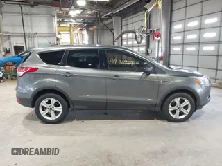 2014 Ford Escape SE with VIN 1FMCU9G99EUC45854, listed as a IAAI auction lot 41986959 with 124,591 mi miles. Bid and sale history available at carsss.com. Image 13.