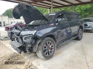 2022 Chevrolet Suburban Z71 z VIN 1GNSKDKD7NR199519, wystawiony jako Copart lot #59356585 z przebiegiem 89 939 mil mil oraz Szkoda całkowita • Salvage title. Historia ofert i sprzedaży dostępna na DreamBid. Obrazek 1.