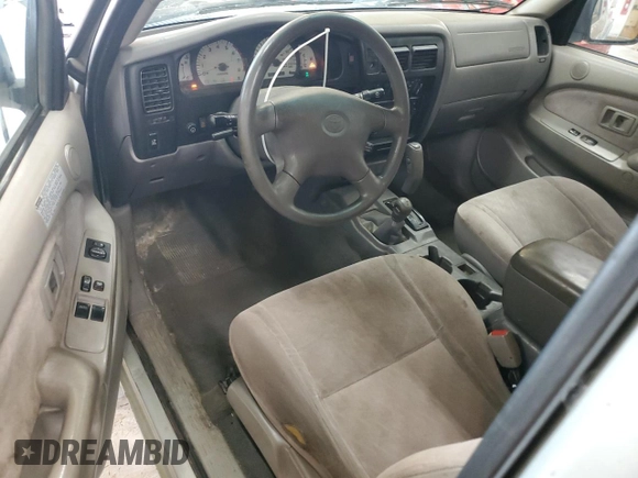 2003 Toyota Tacoma with VIN 5TEWN72N03Z291245, listed as a Copart auction lot 61479755 with 359,047 mi miles and Salvage title. Bid and sale history available at DreamBid. Image 8.