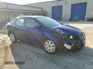 2012 Ford Focus SE with VIN 1FAHP3F22CL233587, listed as a Copart auction lot 48890055 with 71,322 mi miles and Salvage Title. Bid and sale history available at DreamBid. Image 4.