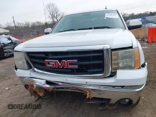2010 GMC Sierra 1500 SLT z VIN 3GTRCWE00AG287606, wystawiony jako IAAI lot #41406243 z przebiegiem 218 866 mil mil oraz . Historia ofert i sprzedaży dostępna na DreamBid. Obrazek 13.