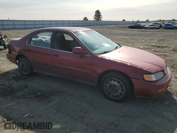 1996 Honda Accord LX with VIN 1HGCD563XTA266206, listed as a Copart auction lot 48601005 with 302,329 mi miles and Salvage Title. Bid and sale history available at DreamBid. Image 4.