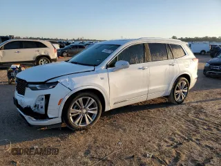 2023 Cadillac XT6 FWD Premium Luxury with VIN 1GYKPCRS5PZ120905, listed as a Copart auction lot 48533775 with 30,694 mi miles and Salvage Title. Bid and sale history available at carsss.com. Image 1.