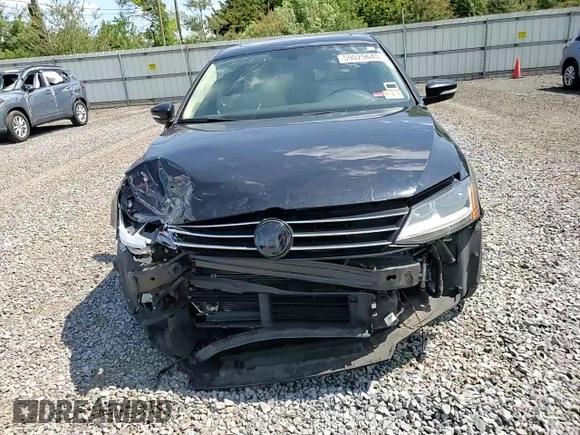 2017 Volkswagen Jetta SEL z VIN 3VWL17AJ6HM404789, wystawiony jako Copart lot #59029645 z przebiegiem 129 788 mil mil oraz Szkoda całkowita • Salvage title. Historia ofert i sprzedaży dostępna na DreamBid. Obrazek 14.