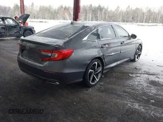 2018 Honda Accord Sedan Sport 1.5T with VIN 1HGCV1F31JA087538, listed as a IAAI auction lot 41479031 with 131,159 mi miles. Bid and sale history available at carsss.com. Image 4.