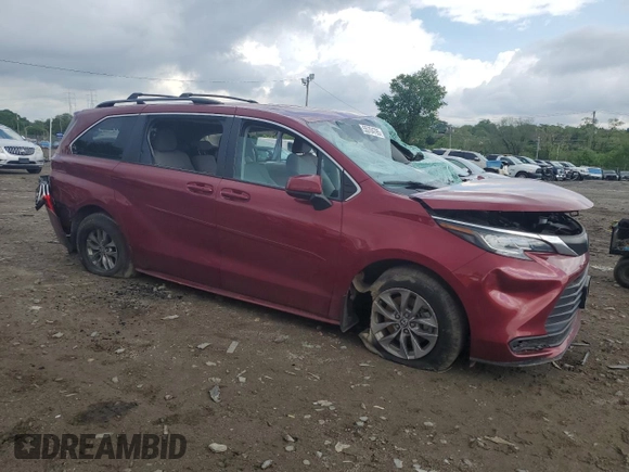 2022 Toyota Sienna LE with VIN 5TDKSKFC9NS056913, listed as a Copart auction lot 55704795 with 71,464 mi miles and Salvage title. Bid and sale history available at DreamBid. Image 4.