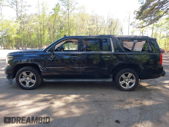 2015 Chevrolet Suburban LT with VIN 1GNSCJKC1FR264255, listed as a IAAI auction lot 42065176 with 115,861 mi miles. Bid and sale history available at carsss.com. Image 14.