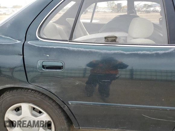 1994 Toyota Camry LE z VIN JT2GK12E2R0039606, wystawiony jako Copart lot #49840015 z przebiegiem 197 834 mil mil oraz Szkoda całkowita • Salvage title. Historia ofert i sprzedaży dostępna na DreamBid. Obrazek 10.