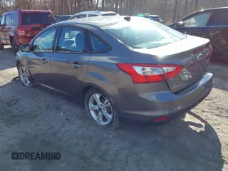 2014 Ford Focus SE with VIN 1FADP3F28EL424707, listed as a IAAI auction lot 42002883 with 115,746 mi miles. Bid and sale history available at carsss.com. Image 3.