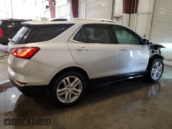 2019 Chevrolet Equinox Premier with VIN 2GNAXYEX4K6254607, listed as a Copart auction lot 46496595 with 69,506 mi miles and Salvage Title. Bid and sale history available at DreamBid. Image 3.