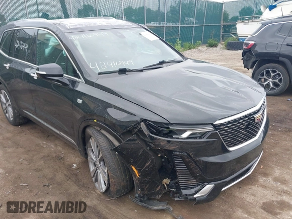 2020 Cadillac XT6 FWD Premium Luxury z VIN 1GYKPCRS6LZ148058, wystawiony jako IAAI lot #42416949 z przebiegiem 79 318 mil mil oraz . Historia ofert i sprzedaży dostępna na DreamBid. Obrazek 6.