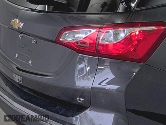 2020 Chevrolet Equinox LT z VIN 2GNAXKEV4L6236136, wystawiony jako IAAI lot #42556211 z przebiegiem 87 001 mil mil oraz . Historia ofert i sprzedaży dostępna na DreamBid. Obrazek 29.