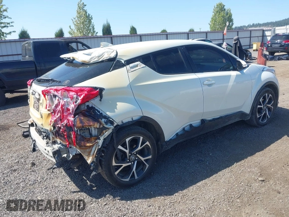 2018 Toyota C-HR XLE z VIN NMTKHMBXXJR041817, wystawiony jako IAAI lot #42174035 z przebiegiem 86 669 mil mil oraz . Historia ofert i sprzedaży dostępna na DreamBid. Obrazek 4.