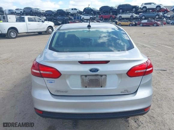 2015 Ford Focus SE with VIN 1FADP3F27FL215346, listed as a IAAI auction lot 41824517 with 124,396 mi miles. Bid and sale history available at carsss.com. Image 16.