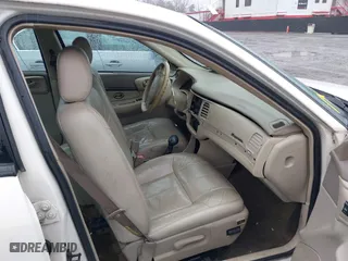 2004 Chevrolet Impala LS with VIN 2G1WH52K749175381, listed as a IAAI auction lot 41148689 with 128,435 mi miles. Bid and sale history available at carsss.com. Image 5.