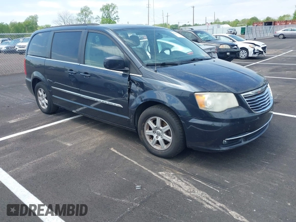2013 Chrysler Town & Country Touring with VIN 2C4RC1BG8DR594671, listed as a IAAI auction lot 42039026 with 208,909 mi miles. Bid and sale history available at carsss.com. Image 1.