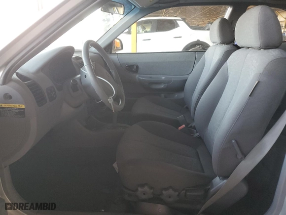 2004 Hyundai Accent GL with VIN KMHCG35CX4U283952, listed as a Copart auction lot 73587124 with 41,742 mi miles and Salvage Title. Bid and sale history available at carsss.com. Image 7.
