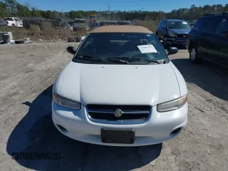 1996 Chrysler Sebring with VIN 3C3EL45X2TT307062, listed as a IAAI auction lot 41683313 with 37,004 mi miles and . Bid and sale history available at DreamBid. Image 6.