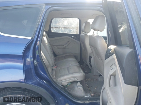 2014 Ford Escape Titanium with VIN 1FMCU9JX4EUD30964, listed as a IAAI auction lot 41772153 with 179,481 mi miles and . Bid and sale history available at DreamBid. Image 8.