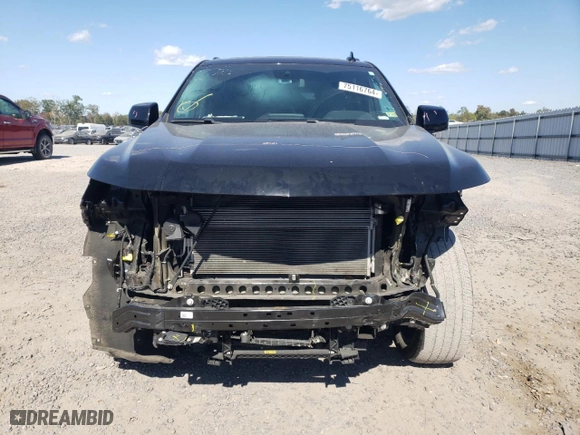 2023 Chevrolet Suburban RST with VIN 1GNSKEKL7PR237198, listed as a Copart auction lot 75116764 with 71,908 mi miles and Salvage Title. Bid and sale history available at carsss.com. Image 5.