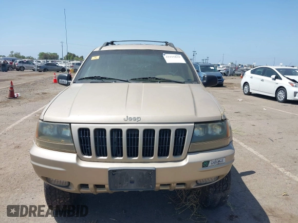 1999 Jeep Grand Cherokee Limited with VIN 1J4GW68N2XC654713, listed as a IAAI auction lot 42115829 with 195,988 mi miles. Bid and sale history available at carsss.com. Image 6.