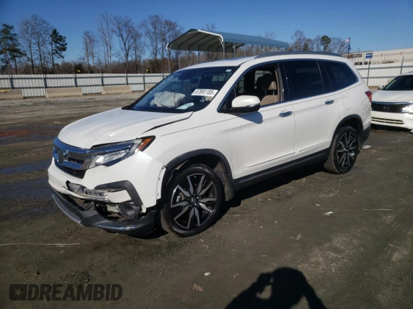 2021 Honda Pilot Touring 8-Passenger with VIN 5FNYF5H94MB001855, listed as a Copart auction lot 87891185 with 55,097 mi miles and Salvage Title. Bid and sale history available at DreamBid. Image 1.