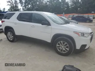 2018 Chevrolet Traverse LS with VIN 1GNERFKW7JJ217709, listed as a Copart auction lot 63332405 with 127,758 mi miles and Salvage title. Bid and sale history available at DreamBid. Image 4.