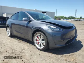 2021 Tesla Model Y Long Range z VIN 5YJYGDEE6MF074492, wystawiony jako Copart lot #54960655 z przebiegiem 57 468 mil mil oraz Szkody całkowita. Historia ofert i sprzedaży dostępna na DreamBid. Obrazek 4.