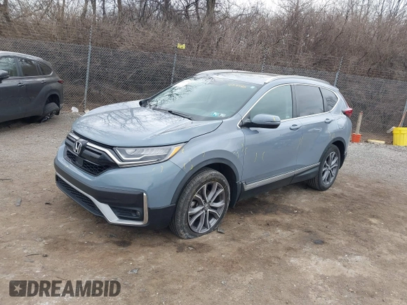 2020 Honda CR-V Touring with VIN 2HKRW2H92LH657975, listed as a IAAI auction lot 41627776 with 46,590 mi miles and . Bid and sale history available at DreamBid. Image 2.