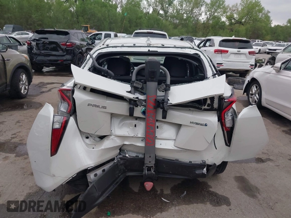 2017 Toyota Prius Two with VIN JTDKBRFUXH3036063, listed as a IAAI auction lot 42036676 with 202,873 mi miles. Bid and sale history available at carsss.com. Image 6.