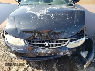 2001 Toyota Solara SE z VIN 2T1FF28P61C526694, wystawiony jako Copart lot #76948134 z przebiegiem Nie podano mil oraz Szkoda całkowita • Salvage title. Historia ofert i sprzedaży dostępna na DreamBid. Obrazek 12.