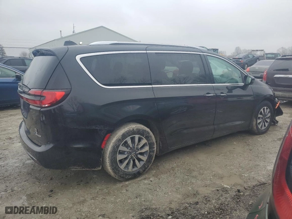 2021 Chrysler Pacifica Hybrid Touring L with VIN 2C4RC1L72MR585897, listed as a Copart auction lot 43123015 with 78,788 mi miles and Salvage Title. Bid and sale history available at carsss.com. Image 3.