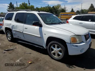 2005 GMC Envoy SLT with VIN 1GKET16M156182653, listed as a Copart auction lot 68747784 with 306,802 mi miles and Salvage Title. Bid and sale history available at DreamBid. Image 4.