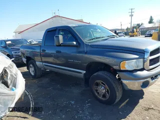 2004 Dodge 2500 SLT with VIN 3D7KU28D34G236830, listed as a IAAI auction lot 41758027 with 221,683 mi miles. Bid and sale history available at carsss.com. Image 13.