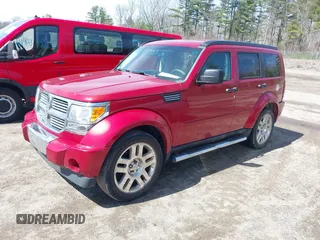 2011 Dodge Nitro Heat with VIN 1D4PU4GK2BW514520, listed as a IAAI auction lot 41919743 with 128,702 mi miles. Bid and sale history available at carsss.com. Image 2.