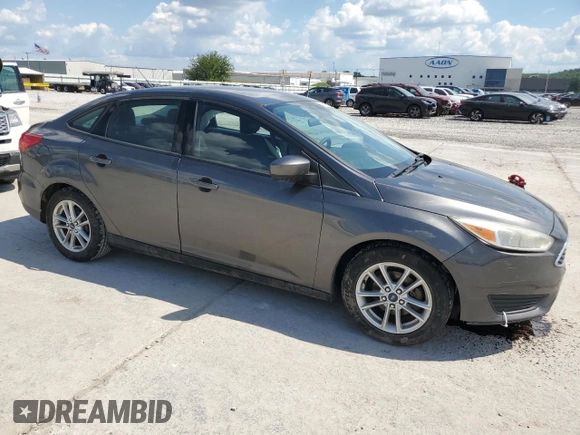 2018 Ford Focus SE with VIN 1FADP3F26JL272212, listed as a Copart auction lot 56644725 with 96,436 mi miles and Salvage title. Bid and sale history available at DreamBid. Image 4.