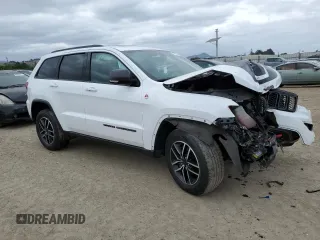 2019 Jeep Grand Cherokee Trailhawk with VIN 1C4RJFLT2KC854714, listed as a Copart auction lot 53761525 with 52,526 mi miles and Salvage title. Bid and sale history available at DreamBid. Image 4.