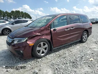 2019 Honda Odyssey EX-L z VIN 5FNRL6H7XKB062710, wystawiony jako Copart lot #59959475 z przebiegiem 150 281 mil mil oraz Czysty tytuł • Clean title. Historia ofert i sprzedaży dostępna na DreamBid. Obrazek 1.