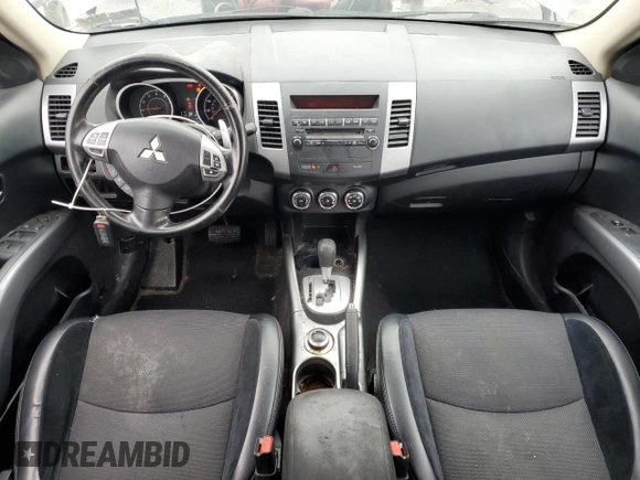 2013 Mitsubishi Outlander SE z VIN JA4JT3AW4DU000656, wystawiony jako Copart lot #51808395 z przebiegiem 158 479 mil mil oraz Szkoda całkowita • Salvage title. Historia ofert i sprzedaży dostępna na DreamBid. Obrazek 8.