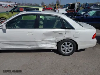2001 Toyota Avalon XL w/Bucket Seats with VIN 4T1BF28B61U169213, listed as a IAAI auction lot 41829245 with 99,940 mi miles. Bid and sale history available at carsss.com. Image 6.