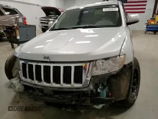 2011 Jeep Grand Cherokee Laredo z VIN 1J4RR4GGXBC609891, wystawiony jako Copart lot #52089645 z przebiegiem 180 895 mil mil oraz Szkoda całkowita • Salvage title. Historia ofert i sprzedaży dostępna na DreamBid. Obrazek 11.