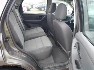 2005 Ford Escape XLS Value with VIN 1FMYU92Z35KA20497, listed as a IAAI auction lot 41509893 with 149,866 mi miles. Bid and sale history available at carsss.com. Image 8.