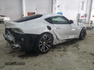 2023 Toyota Supra z VIN WZ1DB2G09PW056248, wystawiony jako Copart lot #51995165 z przebiegiem 20 176 mil mil oraz Szkody całkowita. Historia ofert i sprzedaży dostępna na DreamBid. Obrazek 3.