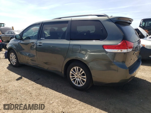 2013 Toyota Sienna XLE AAS с VIN 5TDYK3DC2DS313685, выставлен на аукционе Copart как лот 56064505 с пробегом 115 624 миль миль и Списание • Salvage title. История ставок и продаж доступна на DreamBid. Изображение 2.