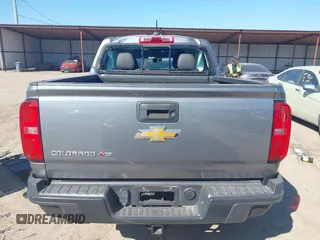 2018 Chevrolet Colorado 4WD ZR2 z VIN 1GCGTEEN0J1115894, wystawiony jako IAAI lot #41774860 z przebiegiem 71 698 mil mil oraz . Historia ofert i sprzedaży dostępna na DreamBid. Obrazek 17.
